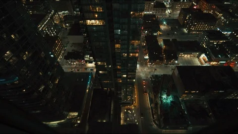 Nighttime Wide Angle down shot highrise and streets Stock Footage 101439929
