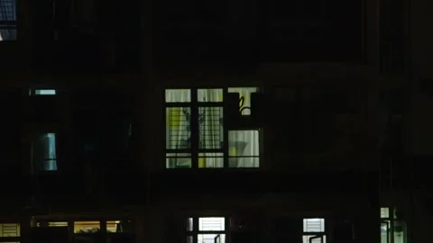 Nighttime, Window of an urban apartment Stock Footage 295921184