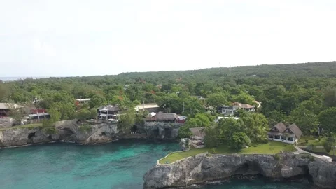 Nigril Jamica pull back drone shot over view 動画素材 283599134