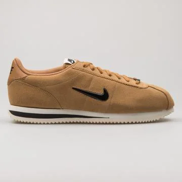 Nike Cortez Basic Suede khaki and black sneaker Stock Photos