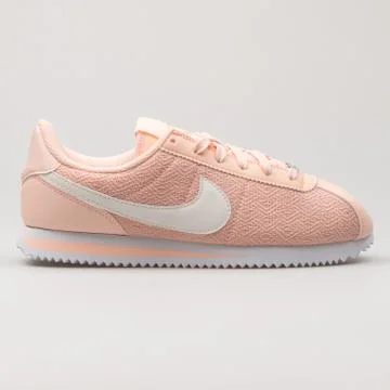 Nike Cortez Basic Textile Suede pink and white sneaker Stock Photos