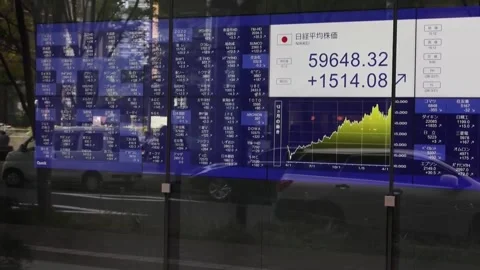 Nikkei hits record after 2.38 % rise on US Iran optimism, JAPAN, JP - 16 Apr 202 Stock Footage 332846861