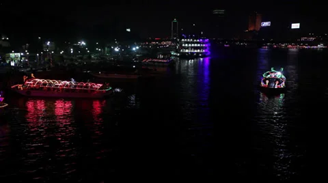 The Nile in Cairo at night, with boat passing by Stock Footage 34813426