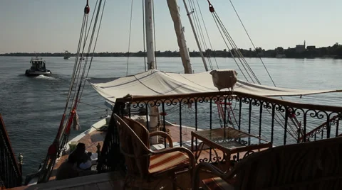 Nile River, Egypt, Dahabiya towed by tug Stock Footage 34987489