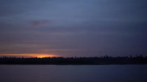 Nile river sunset horizontal line during Egypt cruise Stock Footage 254757224