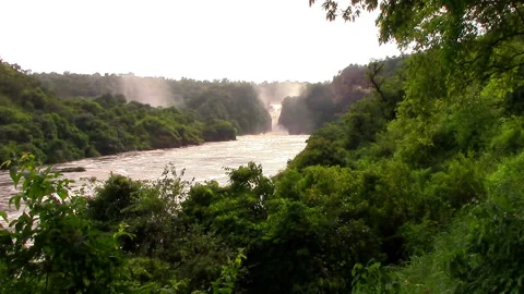 Nile River in Uganda flows through sheer rapids and forms raging waterfalls Stock Footage 106050532