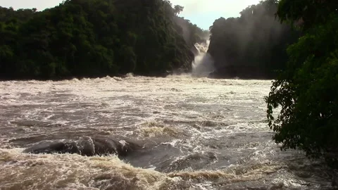 Nile River in Uganda flows through sheer rapids and forms raging waterfalls Stock Footage 106050687
