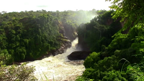 Nile River in Uganda flows through sheer rapids and forms raging waterfalls Stock Footage 106050780