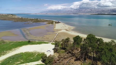 Nin, Croatia. Queen's beach in Nin sandbar aerial view, Velebit mountain back Stock Footage 130423136