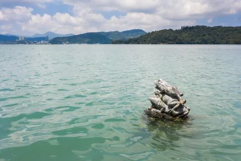 Nine Frog Statue stacks in Sun Moon Lake Stock Photos