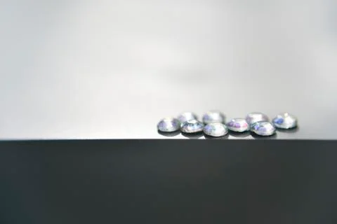 Nine isolated crystals on the plain background with the side light Stock Photos