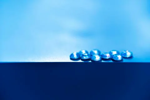 Nine isolated crystals on the plain background with the side light Stock Photos