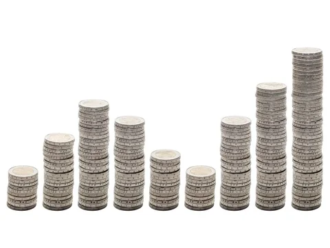Nine stacks of coins rise, fall and rise again - Stop Motion. Stock Footage 72412436