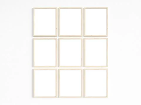 Nine thin wooden frames on a light wall Stock Photos