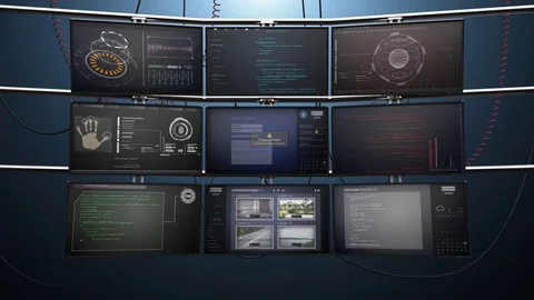 Nine Video Screen Monitors Animate with Data and Surveillance Stock Footage 73044849