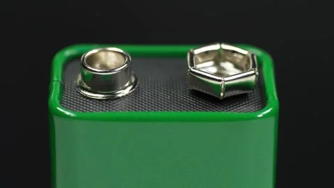 Nine-volt battery - electric battery that supplies a nominal voltage of 9 volts Stock Footage 331102184