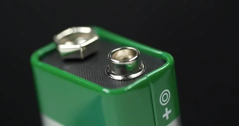 Nine-volt battery - electric battery that supplies a nominal voltage of 9 volts Stock Footage 342142521