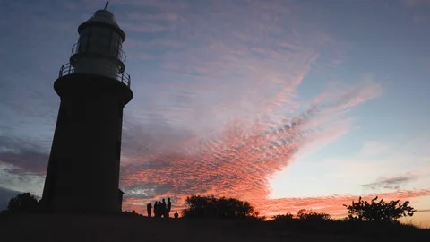 Ningaloo Reef light time lapse showing silhouettes of tourists enjoying the amaz Stock Footage 114526784
