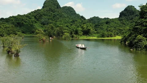 Ninh Binh - Exploring the river Stock Footage 261526185