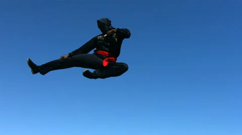 Ninja flips in air, slow motion, Stock Video