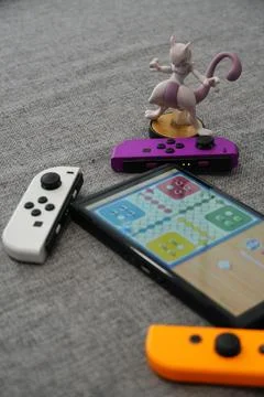 Nintendo Switch Board Game with Colorful Joy-Cons Stock Photos