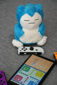 Nintendo Switch Board Game with Colorful Joy-Cons Stock Photos
