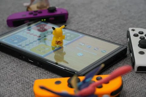 Nintendo Switch Board Game with Colorful Joy-Cons Stock Photos