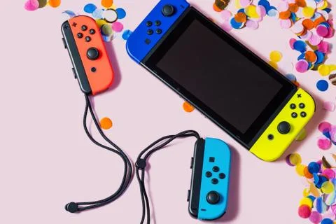 Nintendo Switch video game console party flat lay Stock Photos