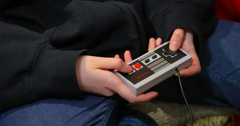 Nintengo NES,playing Super Mario 3 Stock Footage 122303072