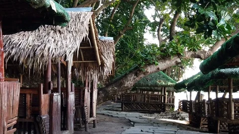Nipa Huts at a Beach in Philippines Stock Footage 120997681
