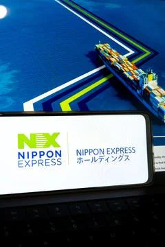 Nippon express logo on mobile device displaying global logistics Stock Photos