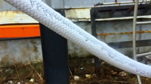 Nitrogen pumping hose slow Stock Footage 90511963