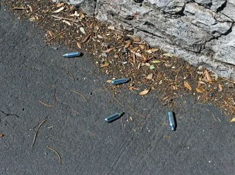 Nitrous oxide canisters Stock Photos