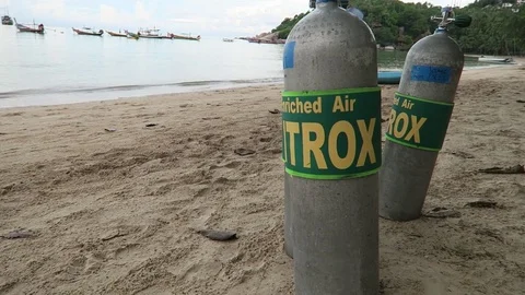Nitrox tanks on beach Stock Footage 81111753