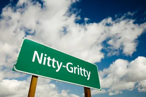 Nitty-Gritty Road Sign with dramatic clouds and sky. Stock Photos