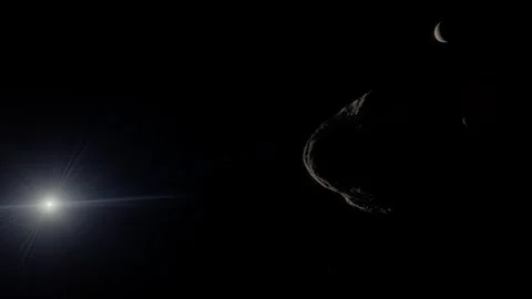 Nix glides past to reveal Pluto and Charon, their icy forms backlit by the Stock Footage 334290088