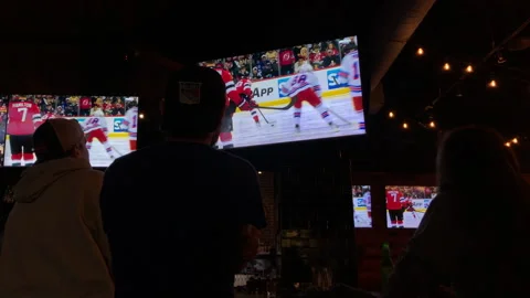 NJ Devils Beat NY Rangers in Game 7 Playoffs Seen on Sports Bar Tv's Stock Footage 240579895