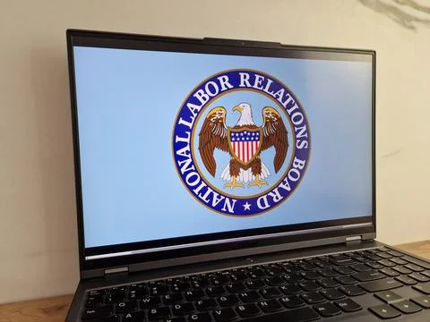 NLRB logo displayed on laptop Stock Photos