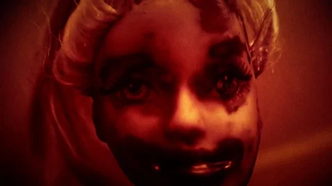 NM Cursed doll rotating yellow Stock-Footage 82158017