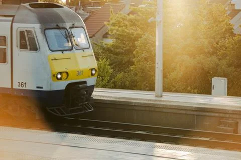 NMBS SNCB train arrival at the railroad station Stock Photos