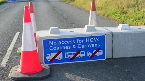No access for hgv's, coaches and caravans on road ahead united kingdom Stock Footage 154455152