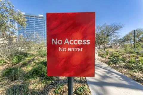 No Access signage by a paved walking trail at Waterloo Park Austin Texas Stock Photos