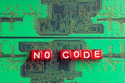 No code inscription on a green microcircuit Stock Photos