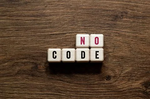 No code - word concept on building blocks, text Stock Photos