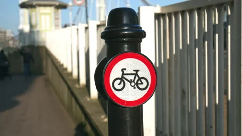 No cycling beyond this point traffic Sign in a park in 4K. Cyclists dismount. Stock Footage 146494267