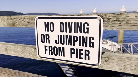 No diving or jumping from pier sign Stock Footage 336878060