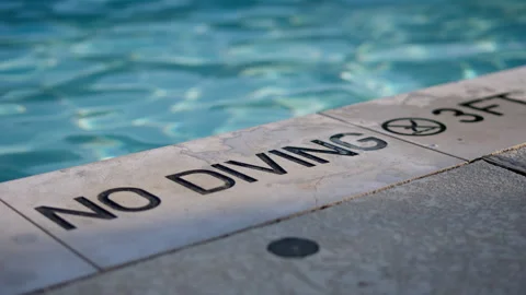 No Diving Sign at the Swimming Pool Stock Footage 341321944