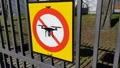No drone sign at park entrance of Copenhagen, quadrocopters prohibition, privacy HD Footage