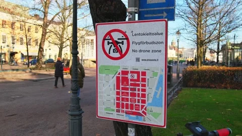 The No Drone Zone sign in Central Helsinki, Finland Stock Footage 164107141