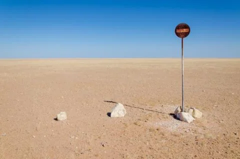 No entry or passage prohibited sign in the middle of the Namib Desert isolated Stock Photos